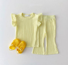 Girl yellow T-shirt bell bottom pants outfits