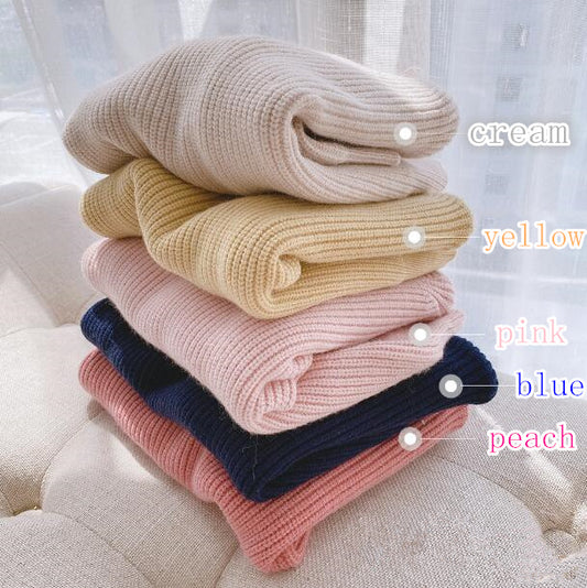 Pull en tricot couleur bonbon pour enfant